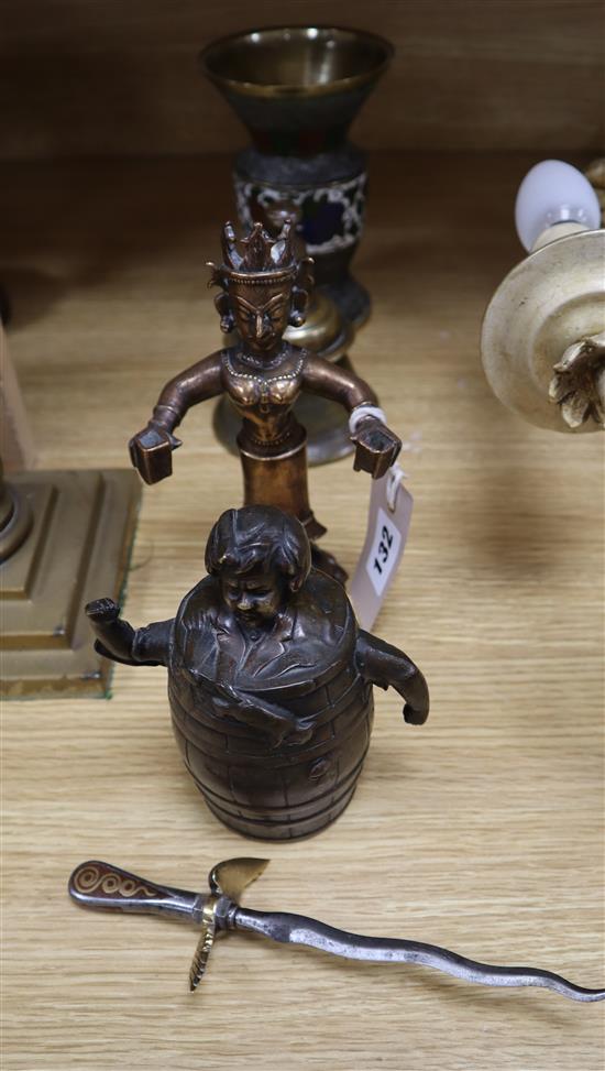 A novelty boy in a barrel bell, an Indian figure and bell and a Japanese vase